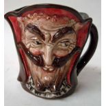 A rare Royal Doulton double face character jug of small proportions, modelled as Mephistopheles,