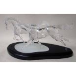 A Swarovski silver crystal group, The Wild Horses, limited edition 8463/10000 on plinth with