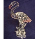 A Swarovski crystal model Flamingo with pink beak and tail feathers, original box and certificate