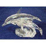 A Swarovski lead crystal Collectors Society model 1990 edition, Lead Me - The Dolphins, in