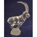 A Swarovski crystal model Ibex on a rock, original box