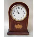 An Edwardian mahogany and inlaid dome top mantel clock of small proportions, white face with