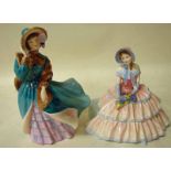 Two Royal Doulton figures, Delphine HN2136, 19cm high and Day Dreams HN1731, 15cm high (2)