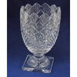 An impressive clear cut glass footed vase of Regency style U form, hobnail and diamond cut