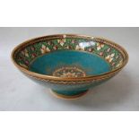 A Mintons Pottery bowl of circular footed form, central octagonal floral medallion on a mottled