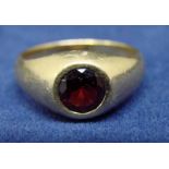 A gentleman’s 18ct gold ring set with a single garnet approx. 1.8ct, 15.7g total weight, ring size Z