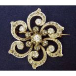 A fine quality 19th century French 18ct gold and old cut diamond brooch of circular target form,