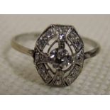 A ladies 18ct white gold and diamond ring, Art Deco geometric form, central stone approx 0.2ct
