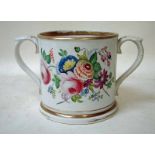 A Victorian Staffordshire pottery large loving cup of cylindrical two-handle form, hand painted with