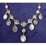 A ladies vintage costume necklace, nine graduating moonstones in gilt oval mounts, seven