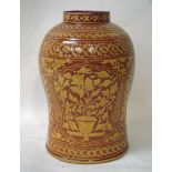 A late 19th/early 20th century Arts and Crafts glazed earthenware vase, baluster form with