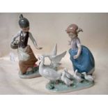 A Lladro porcelain figural group, Girl being chased by Goose, number 1288, discontinued, 22cm high