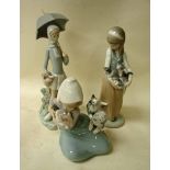 Three Lladro porcelain figural groups, Kneeling Girl with two Puppies, Girl with Geese and