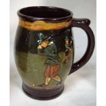 A Royal Doulton stoneware mug of ovoid form, decorated in relief with scenes of gentlemen golfers on