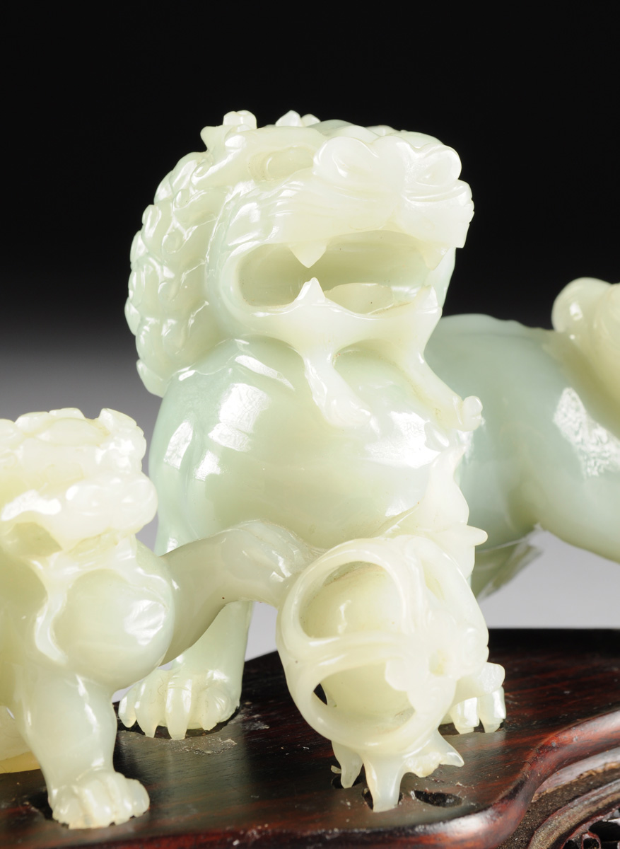 A CHINESE CARVED JADEITE FIGURAL GROUP OF TWO FOO DOGS, 20TH CENTURY, of a large foo dog with a - Image 5 of 8