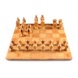 ELLIOTT FRANZ SANDOW (American 1910-1976) A THIRTY THREE PIECE VINTAGE AMERICAN CARVED WOOD CHESS