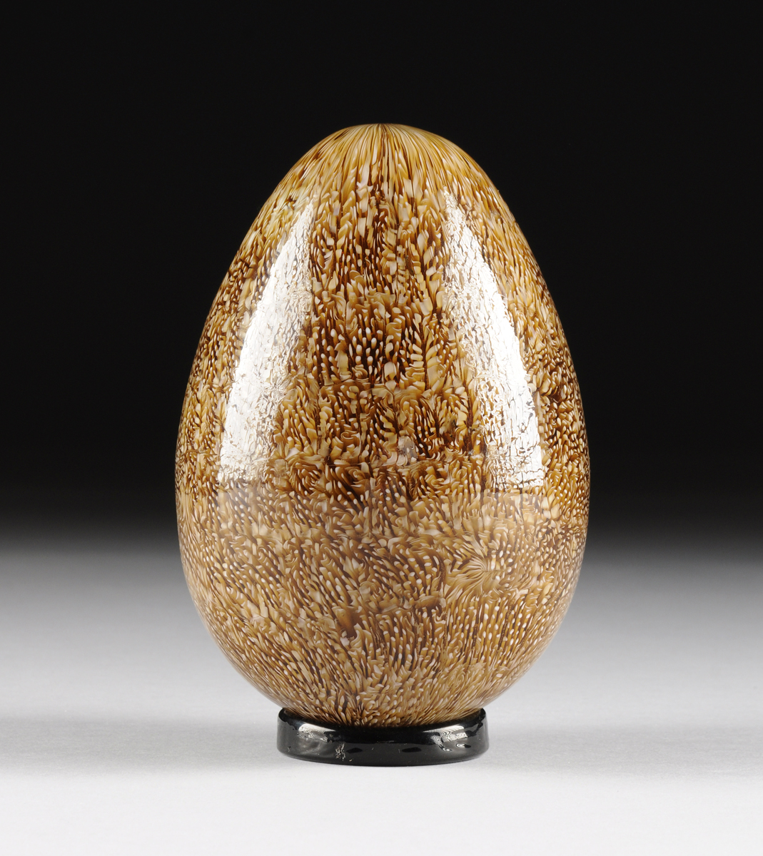 AN ITALIAN ART GLASS EGG FORM SCULPTURE, BY VENINI, ENGRAVED SIGNATURE, 20TH CENTURY, of traditional