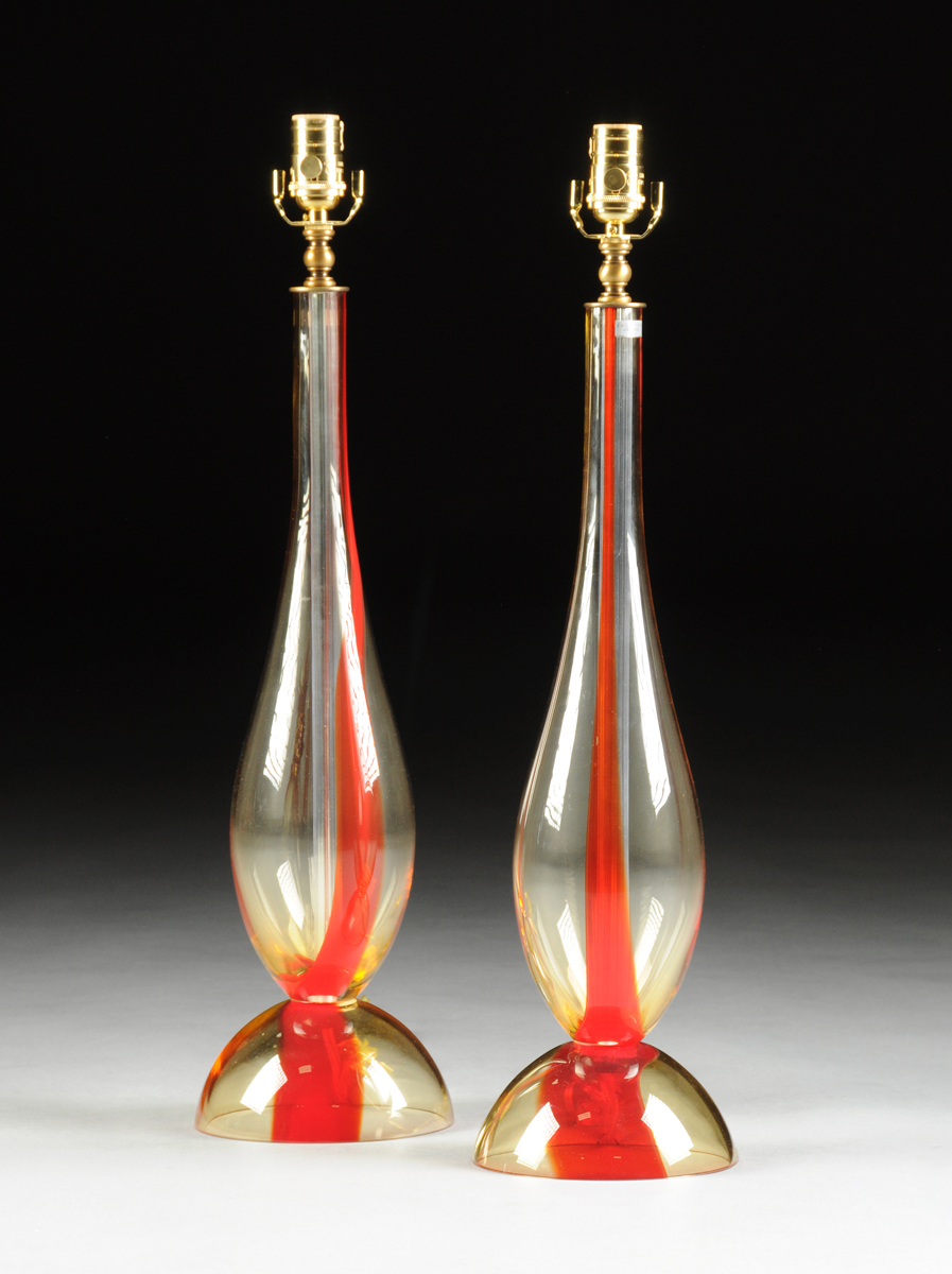 A PAIR OF CONTEMPORARY WATERFORD RED STREAKED AMBER GLASS LAMPS, EVOLUTION PATTERN, SIGNED,
