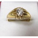 An 18 carat gold gentlemans ring set solitaire diamond (approx just under 3/4 carat)