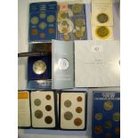 A tin of coin sets in presentation pack including Jersey 1981 currency set, Guernsey type set unc.