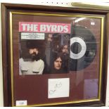 A Byrds presentation single signed by Roger McGuinn