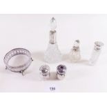 A group of silver and cut glass scent bottles, cruets etc.