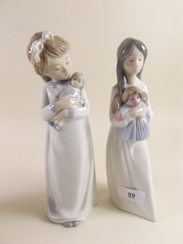 Two Nao figures - girls with dolls