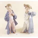 Two Nao figures - boy and girl in night attire