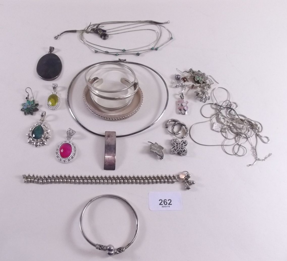 An assortment of silver costume jewellery
