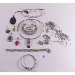 An assortment of silver costume jewellery