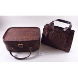 A crocodile skin vanity case and handbag