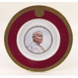 A Royal Worcester limited edition plate painted Pope John Paul II - 141/1000