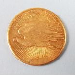 A gold 20 Dollars 1909 San Francisco Mint "In God we Trust" below eagle approx. 33 grams cond.