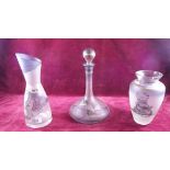 A Romanian glass decanter and two vases