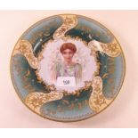 A porcelain cabinet plate painted bust of a girl and flowers in deep floral gilded border - probably