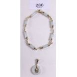 A 9ct gold Chinese 'jade' bracelet and pendant