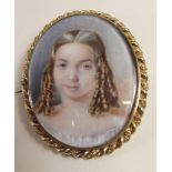 A watercolour miniature of a girl in yellow metal rope twist frame - 6.5 x 5cm