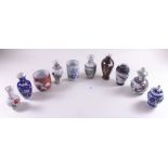 A group of ten miniature vases