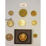 A tray of coins and medallions including Canada 1867-1967 dollar, two other silver coins, brass