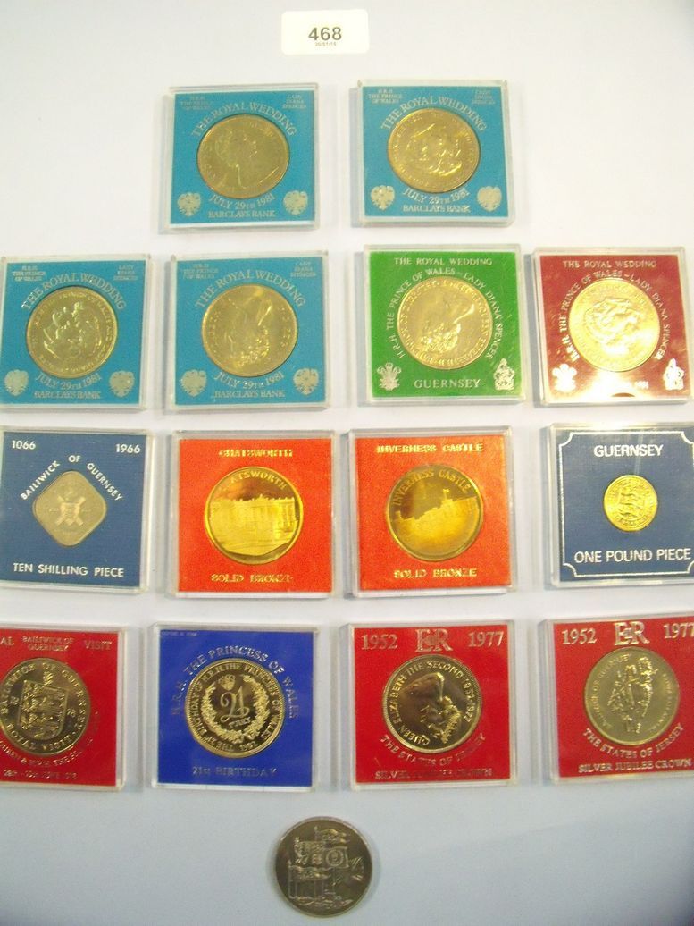 A box of 14 commemorative tokens/coins including six royal wedding Charles & Diana including