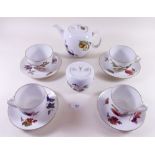 Six large Royal Worcester Evesham cups and saucers, six smaller cups and four saucers, sugar and a