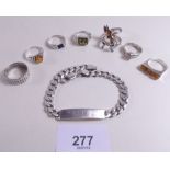 A group of silver rings and bracelet