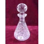 A cut glass decanter