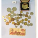 A tray of world coins, medallion for Napoleon 1, China banknote, Churchill crown, Charles & Diana