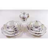 An Edwardian Melba teaset printed violets comprising: ten cups and saucers, twelve tea plates, two