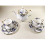 A Royal Albert "Moonlight Rose" part tea and dinner service comprising: five cups and saucers, two