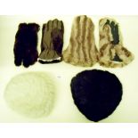 Two pairs of fur gloves, one fur hat and one other