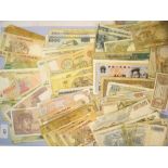 A wad of world banknotes including Europe, Eastern Europe, India and Far East - countries include
