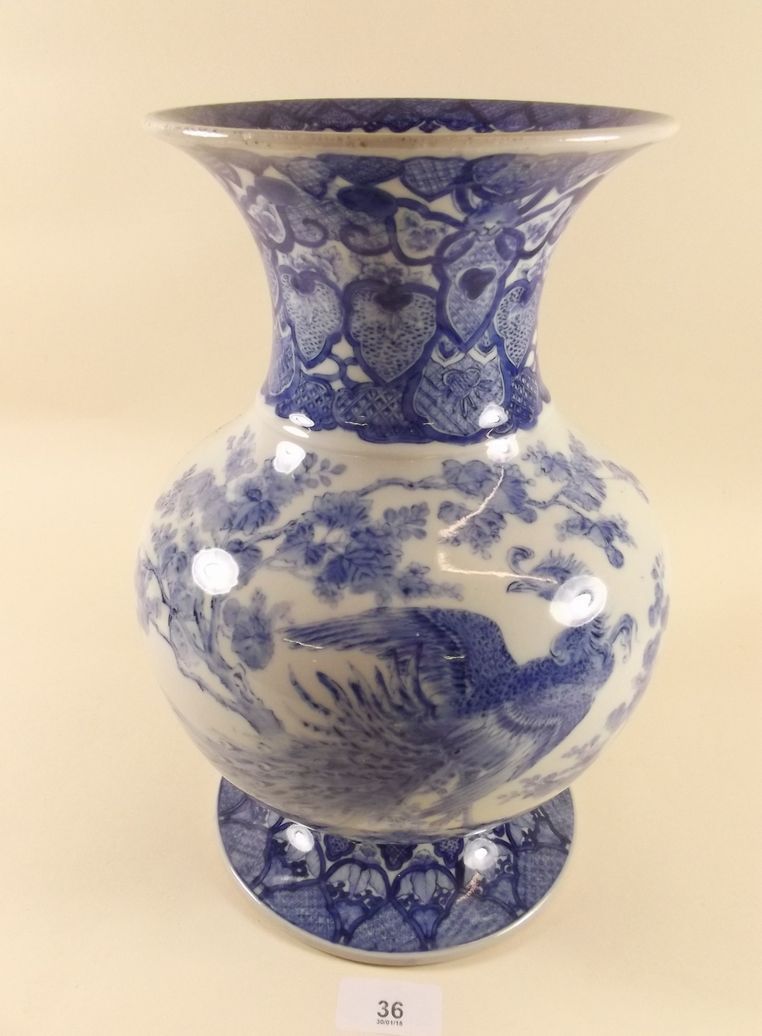 A Chinese blue and white vase decorated exotic bird, 29cm high