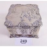 A Dutch early 20th Century silver trinket box embossed landscapes and figures, 7cm sq. 3.7ozs